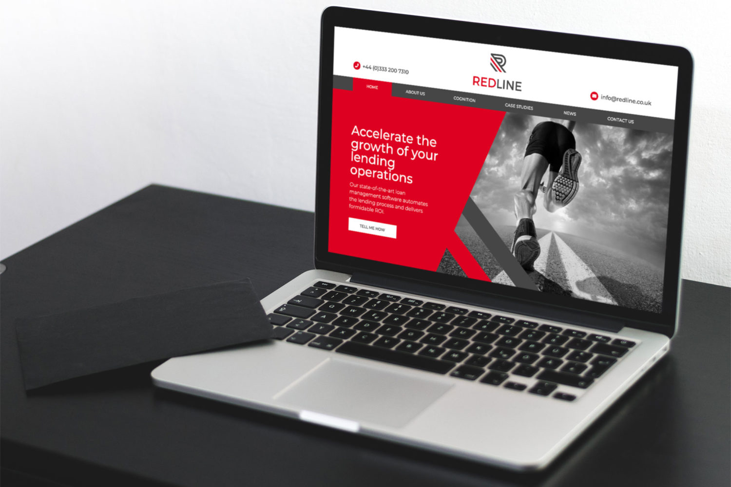 Custom WordPress website for Redline shown on a MacBook Pro by Supersonic Playground