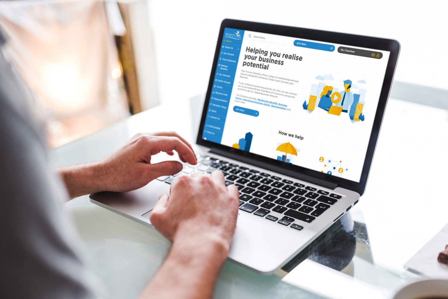 Custom WordPress and WooCommerce eCommerce website for Kent Invicta Chamber of Commerce shown on a MacBook Pro by Supersonic Playground