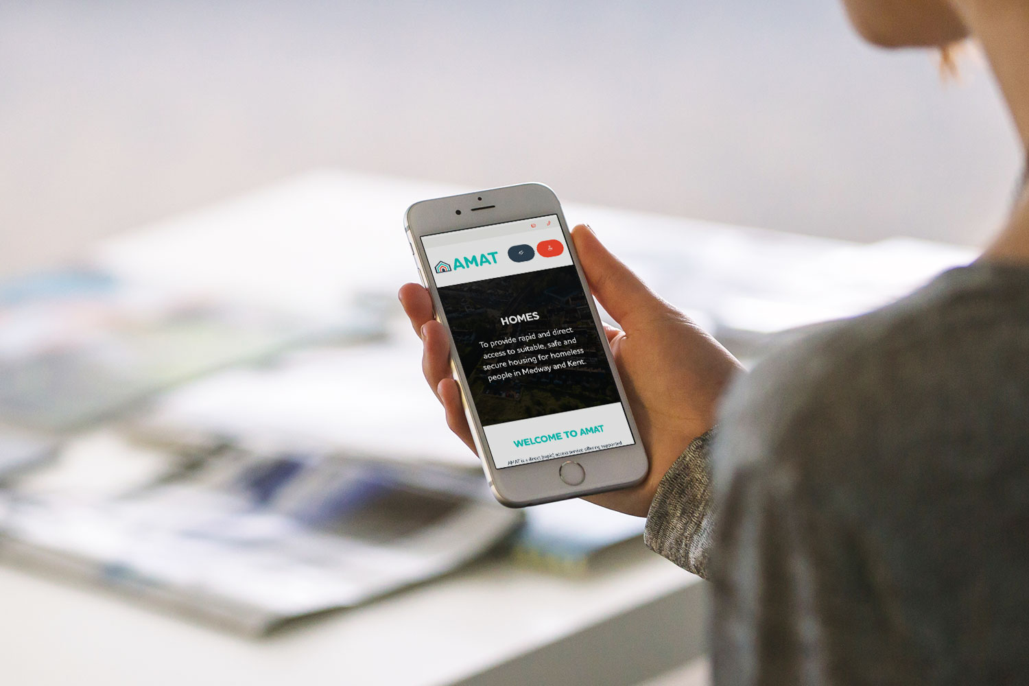 Small Business Package Website for AMAT shown on an iPhone by Supersonic Playground